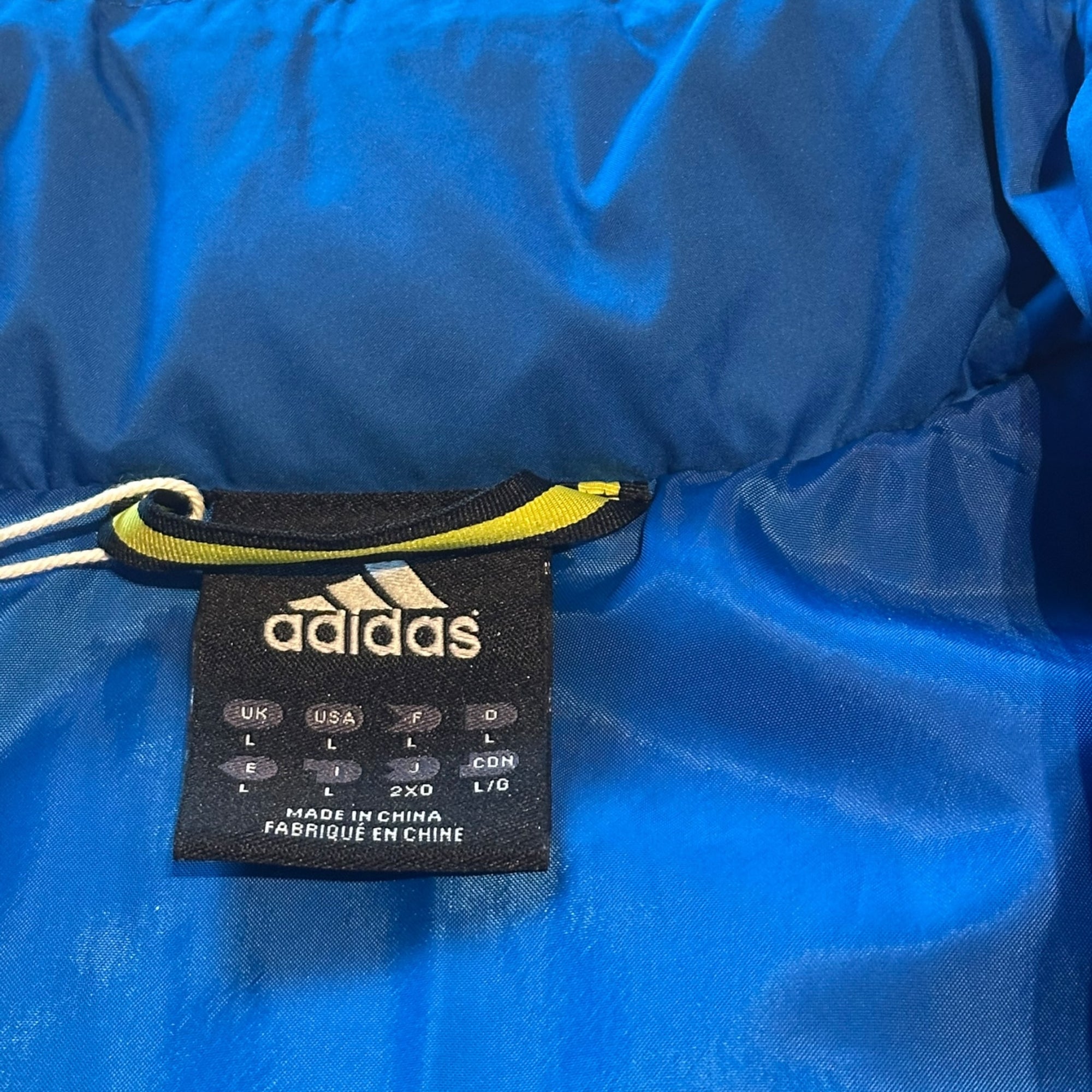 Blaue adidas Steppweste (L)